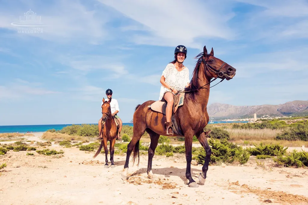 Horse riders on the beach near Agadir with the Atlantic Ocean behind