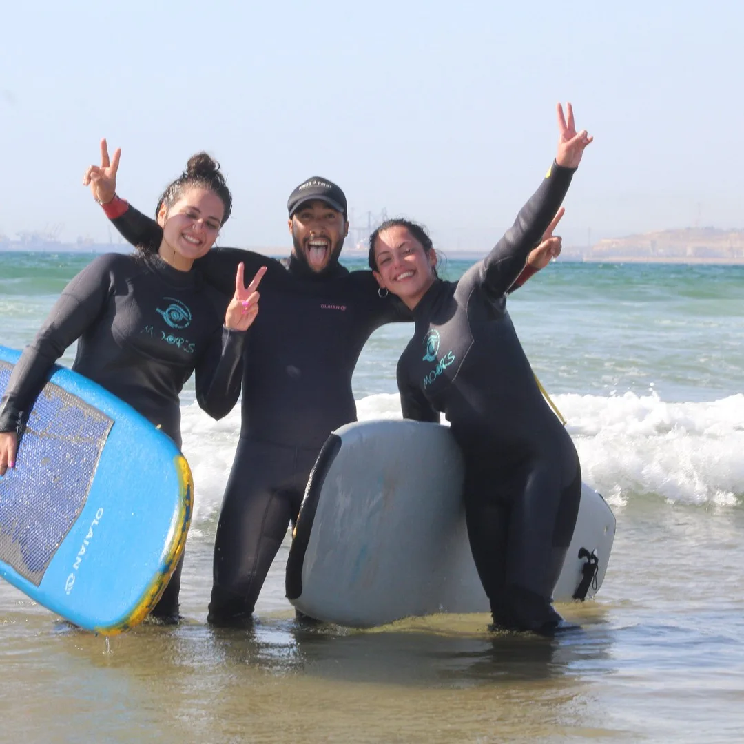 Surfers on the beach at Taghazout on the Atlantic coast